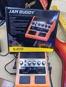 JOYO Jam Buddy rechargeable dual-channel pedal guitar amplifier with Bluetooth, delay effect, and built-in speakers for portable guitar practice.